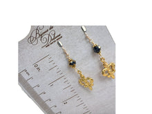 Load image into Gallery viewer, Black &amp; Gold Fleur de lis Earrings
